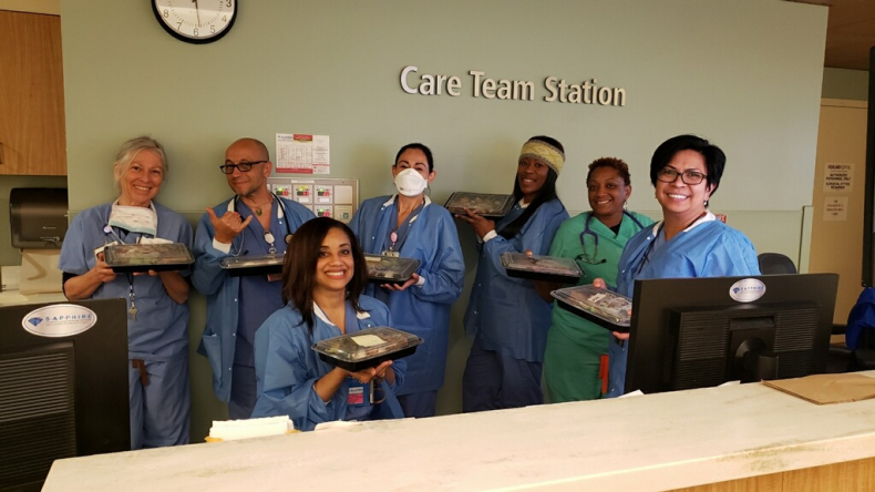 Staff at Highland Hospital receive meals prepared by Nido's Backyard in Oakland, Calif. Photo courtesy of East Bay FeedER